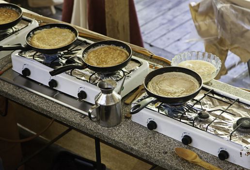 Pans with tortillas in a market