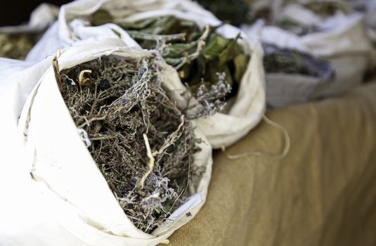 Aromatic herbs in a market, detail of herbal medicine and condiments, aroma and taste, health