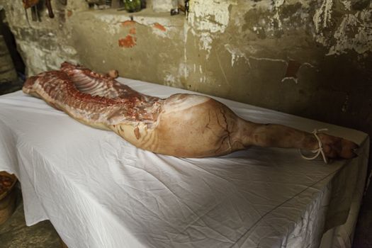 Detail of half cut pork, meat in a butcher shop