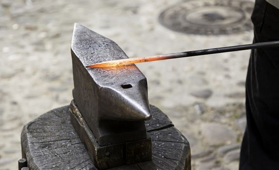 Red hot iron in a forge, working with hot iron, traditional work