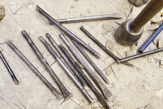 Old tools for stone carving handcrafted, detail of a manual craft