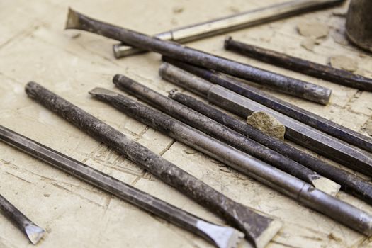 Old tools for stone carving handcrafted, detail of a manual craft