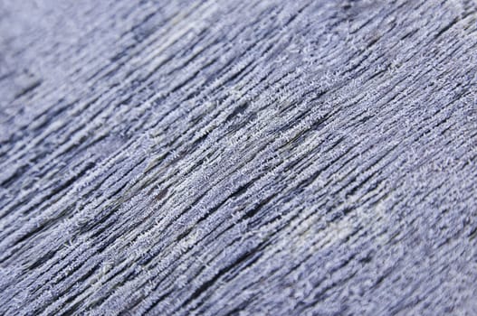 Detail of frozen wood in winter, detail of cold and ice