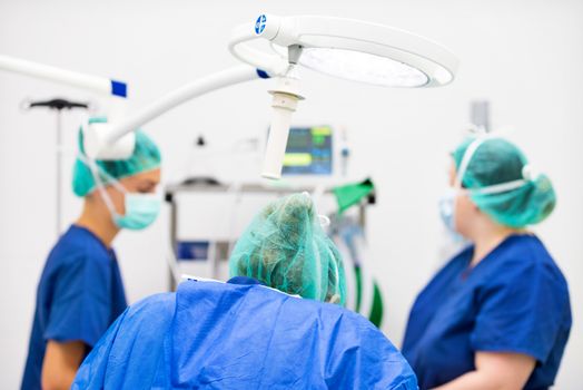 Surgery team operating