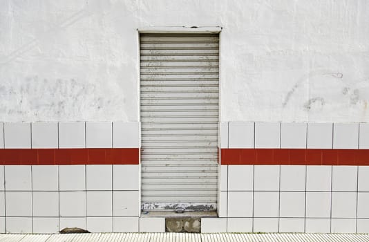 Wall with door closed, abandoned the local detail, exterior detail in the city