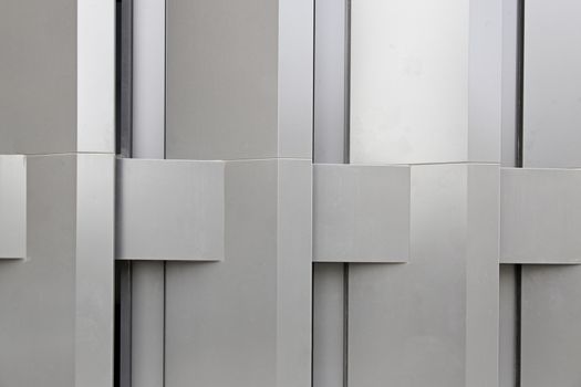 Modern metal wall detail metal coating on a modernist facade, urban art