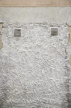Cement wall grids, detail in the city wall, background with texture urban