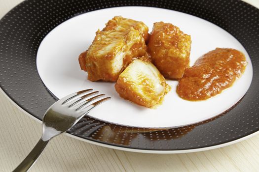 Cod Fish with Tomato, detail of fish cooked with sauce