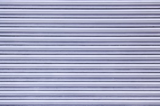 Blue metal wall, detail of a metallic background with texture, decoration and protection
