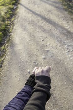 Hands of a loving couple, detail of a folded hands, love and affection