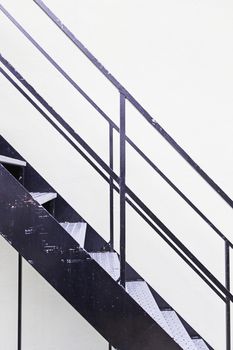 Metal ladder on a facade, detail of a building