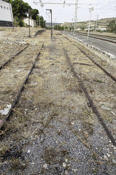 Railroad tracks at a station, detail of a tract for passenger trains