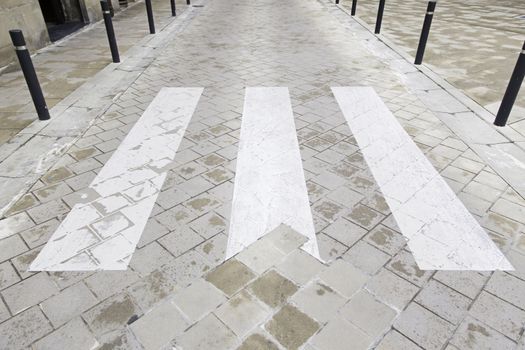 Zebra crossing on asphalt, detail signal on a highway, pedestrian
