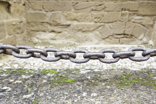Metal chain in a castle, detail of a chain of protection