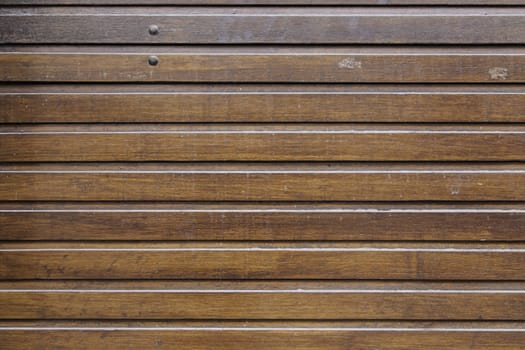 Metal timber wall, detail of a wall decorated with wood, textured background