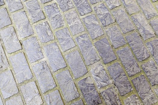 Cobblestone floor, detail of a pedestrian land in the city
