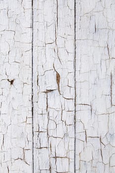 Chipped and old wood, detail of an abandoned wall textured background