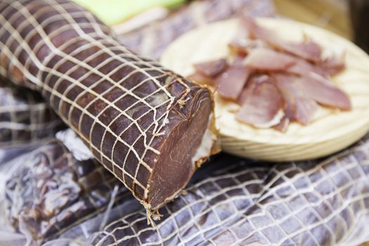 Cured pork loin, beef jerky detail in a market