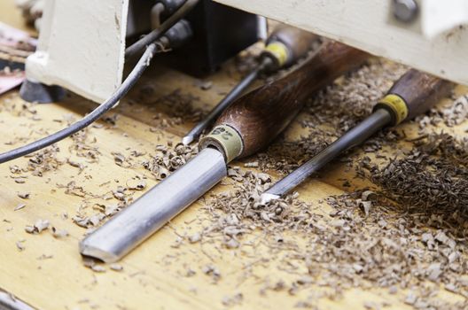 Craftsman working with wood, detail of an ancient craft, art wood