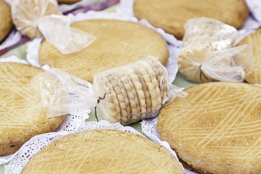 Typical Spanish cream homemade pie, a sweet dessert detail of artisan food in a street market