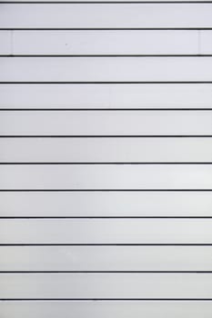 Bright metal background, detail of a textured steel