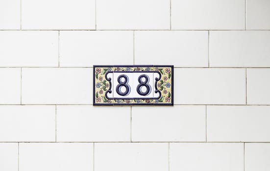 Number eighty-eight on a wall, detail d eun information number