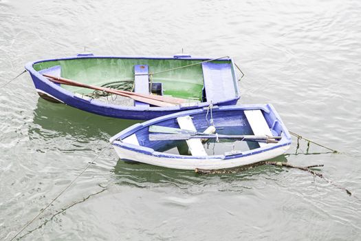 Old fishing boats, detail of a boat at sea, transport and fishing