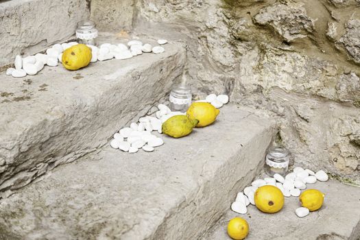 Lemons with stones in a spa, detail of a decoration with fruit