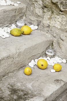 Lemons with stones in a spa, detail of a decoration with fruit
