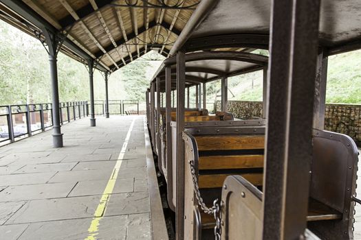 Old wooden seats in a train, detail of a conveyance