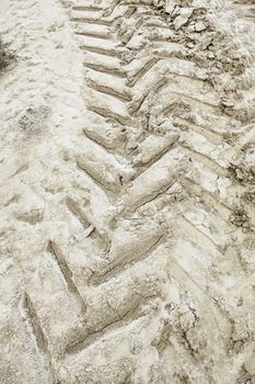 Wheel tracks in the mud, detail footprints Car