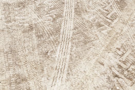 Wheel tracks in the mud, detail footprints Car