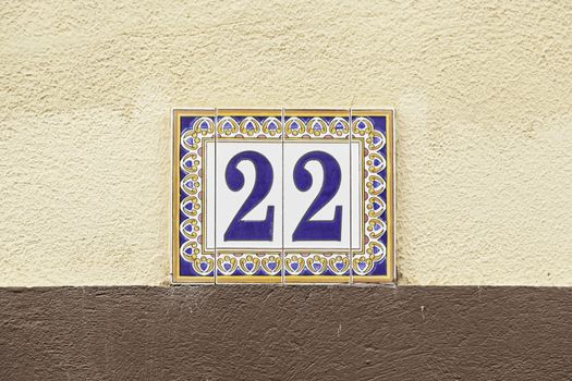 Number twenty on a wall, detail of an even number of information