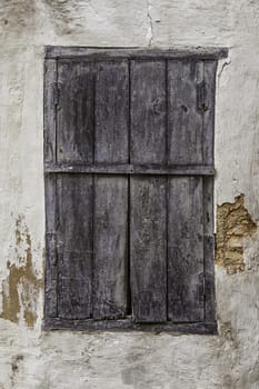 Old wooden door with lock, detail of security and protection, antiquity