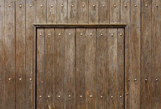 Old wooden door with lock, detail of security and protection, antiquity