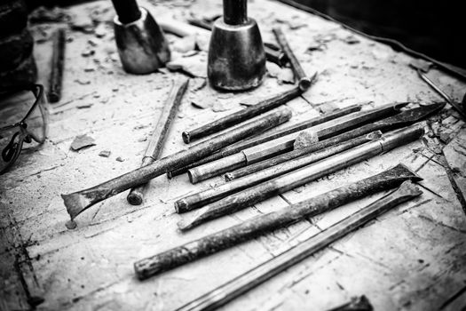Old tools for stone carving handcrafted, detail of a manual craft