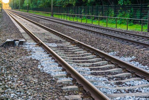 double train railway tracks vanishing in the horizon transport or travel background