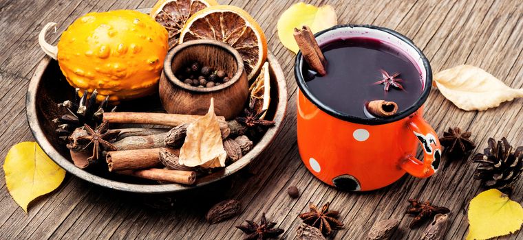 Mulled wine hot drink with citrus and spices
