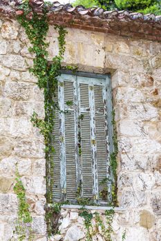 Old window details of Tatoi Palace which is a former Greek Royal Family summer residence and birthplace of King George II of Greece.