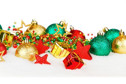 Beautiful colorful christmas decoration in snow with white copy space