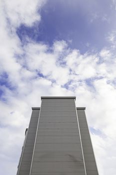 Perspective Building, detail of a tall building on the outside of a city, modern architecture