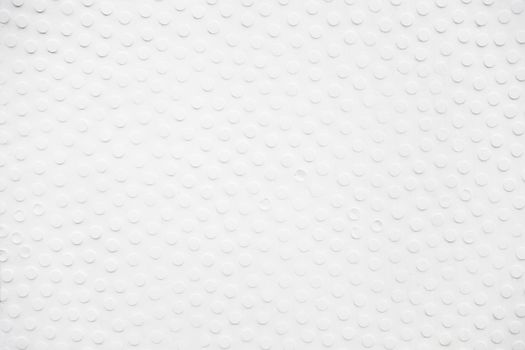 White wall relief, detail of a facade on a building in the city