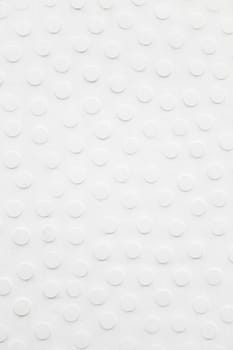 White wall relief, detail of a facade on a building in the city