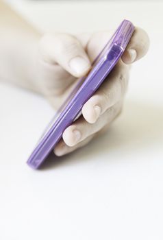 Using mobile phone, detail of a hand using a mobile phone the latest generation, technology