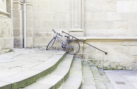 Bicycle parked on stairs, detail of a healthy veiculo transport and ecological