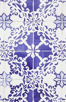 Typical old Lisbon tiles, detail of a classic ceramic tiles, art of Portugal