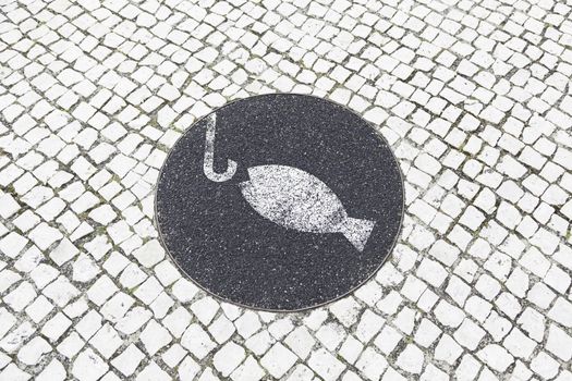 Fishing allowed sign, detail of a signal information for fishermen
