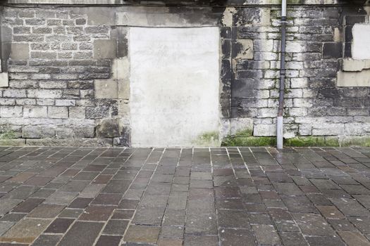 Old ruined wall with door, background