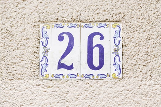 Number twenty in the city, a number of detailed information on a wall, text and figure