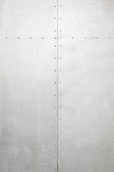 Metallic background with texture detail of a coated metal wall, protection and security